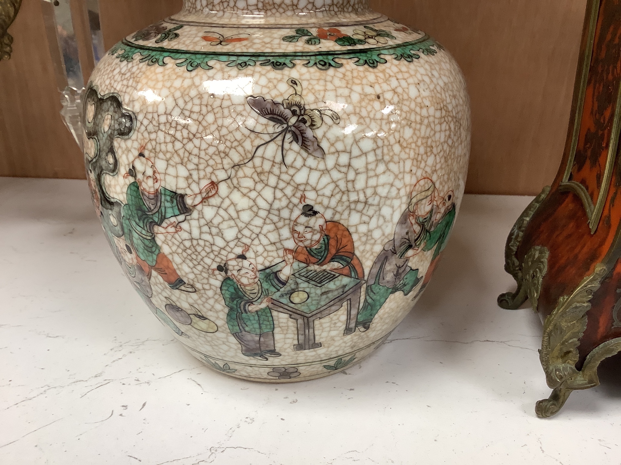 A Chinese famille verte crackle jar, early 20th century, 18cm high